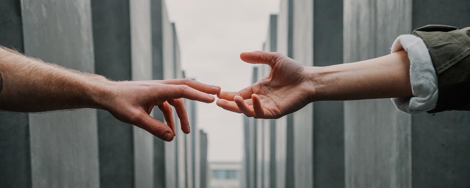 Hands reaching