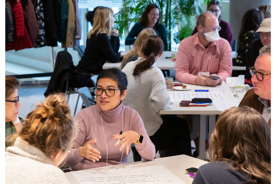 Staff members collaborating in a workshop