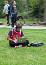 Young man online outside