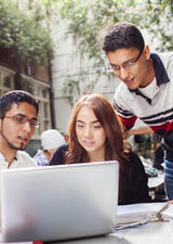 three students working together